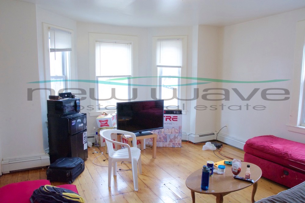 4 bed, 1 bath apartment for rent at 203 Hillside St Unit 3, Mission Hill — photo 1 of 13