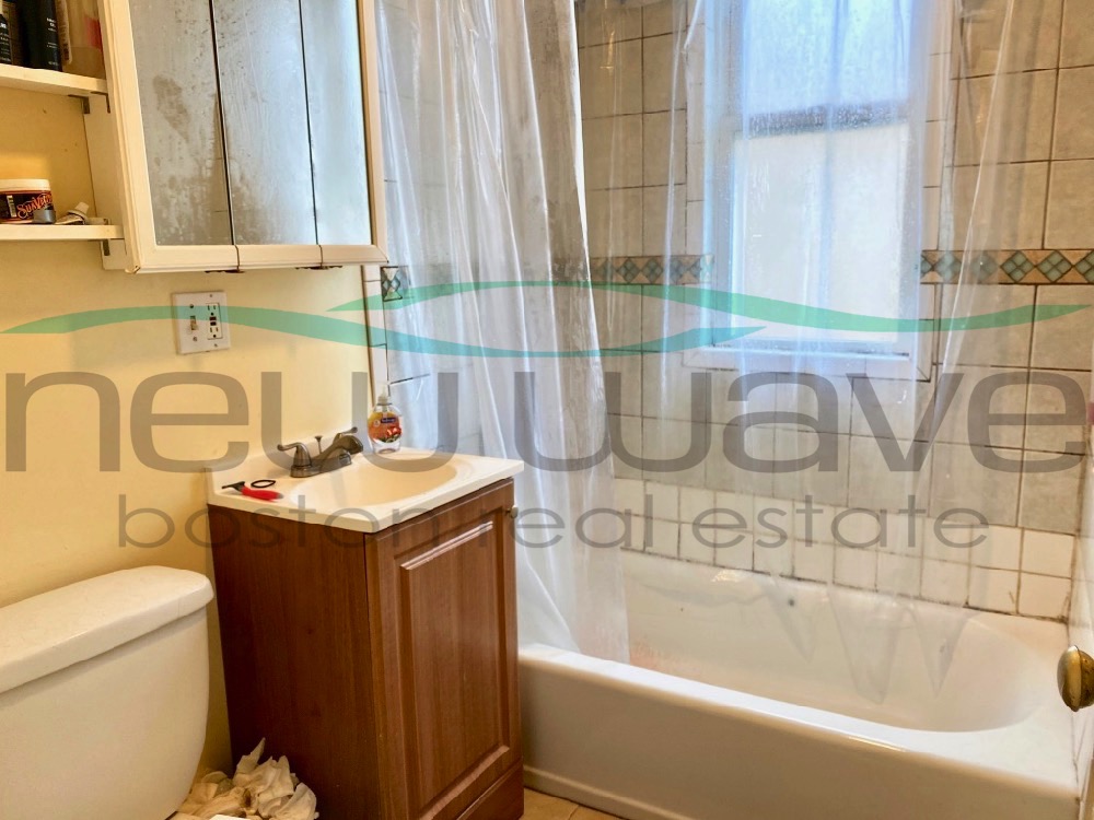 4 bed, 1 bath apartment for rent at 12 Bucknam St Unit 3, Mission Hill — photo 4 of 9