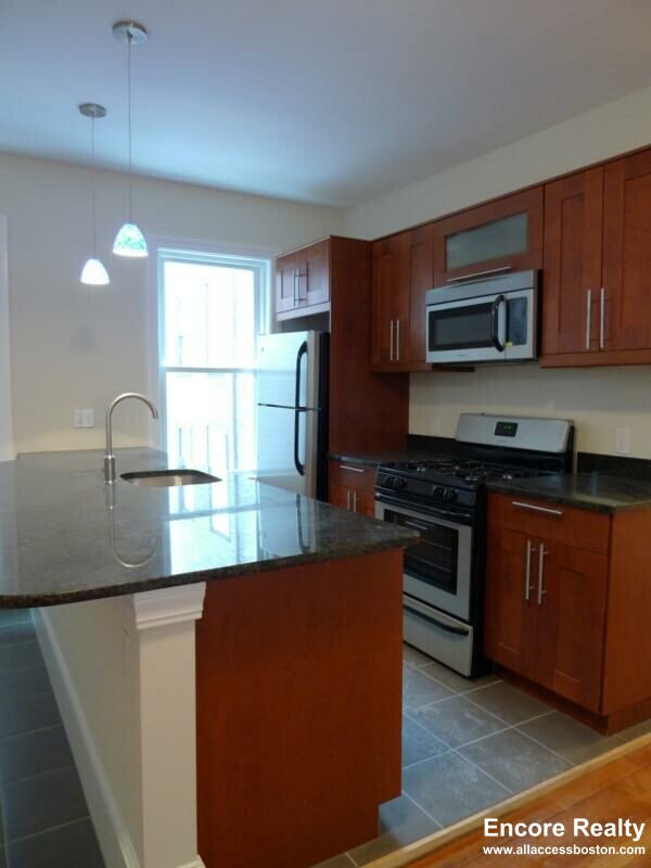5 bed, 2 bath apartment for rent at 12 Wensley St Unit 1W, Mission Hill — photo 3 of 52
