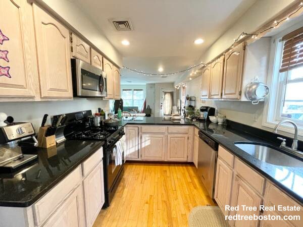 4 bed, 3 bath apartment for rent at 6 Harleston St, Mission Hill — photo 2 of 25