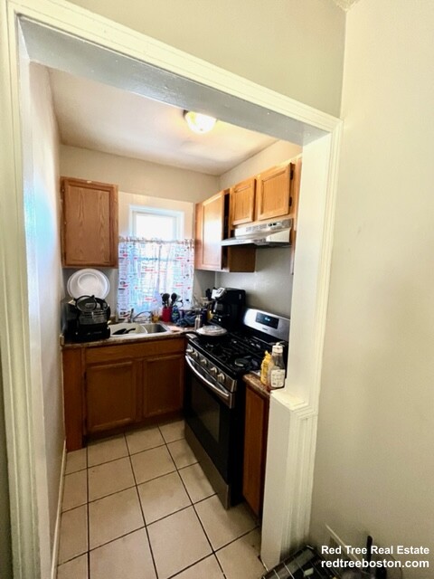 3 bed, 1 bath apartment for rent at 11 Kenberma Rd Unit 2, Dorchester — photo 4 of 7