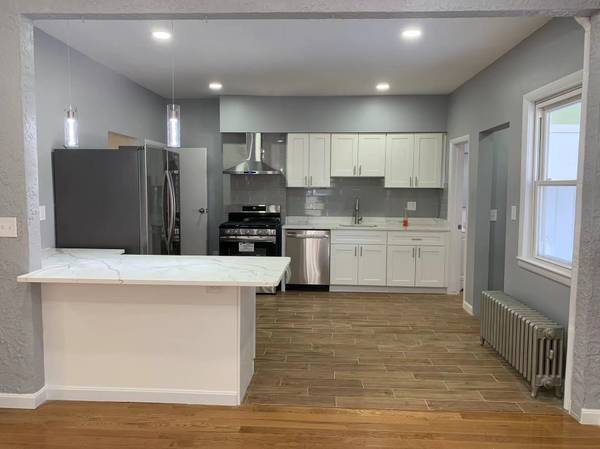 2 bed, 1.5 bath apartment for rent at 21 5th St Unit 1, Medford — photo 1 of 8
